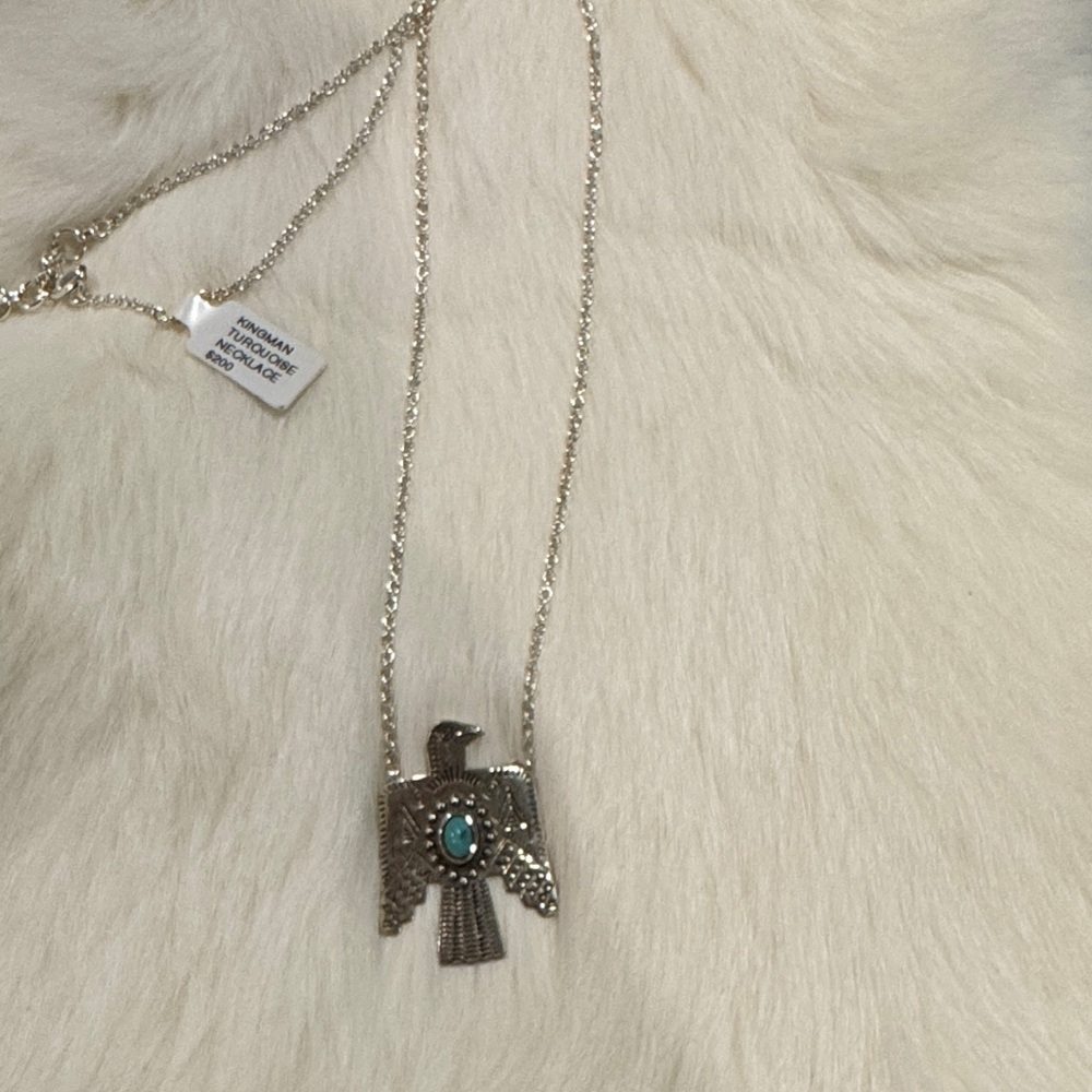 Silver Thunderbird Necklace with Turquoise Accent
